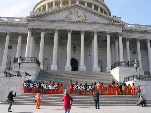 Broken promises, broken laws: protestors calling for the closure of Guantanamo.